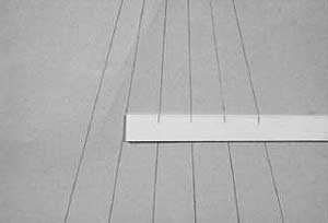 поместите эту полоску на лист бумаги, размеченный расходящимися от центра линиями