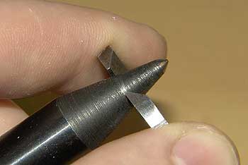 На каком-нибудь конусе отмечаем этот размер