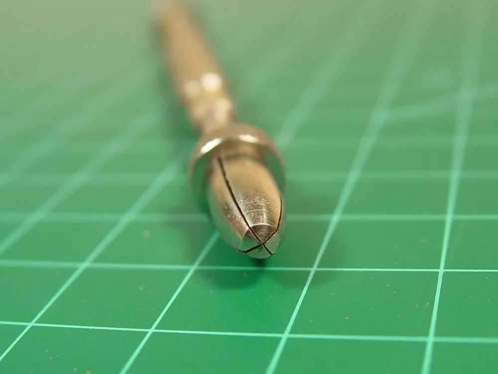 Двухсторонняя минидрель со скользящим зажимом